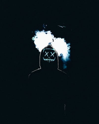 Atmospheric silhouette with smoke — anime industry news visual